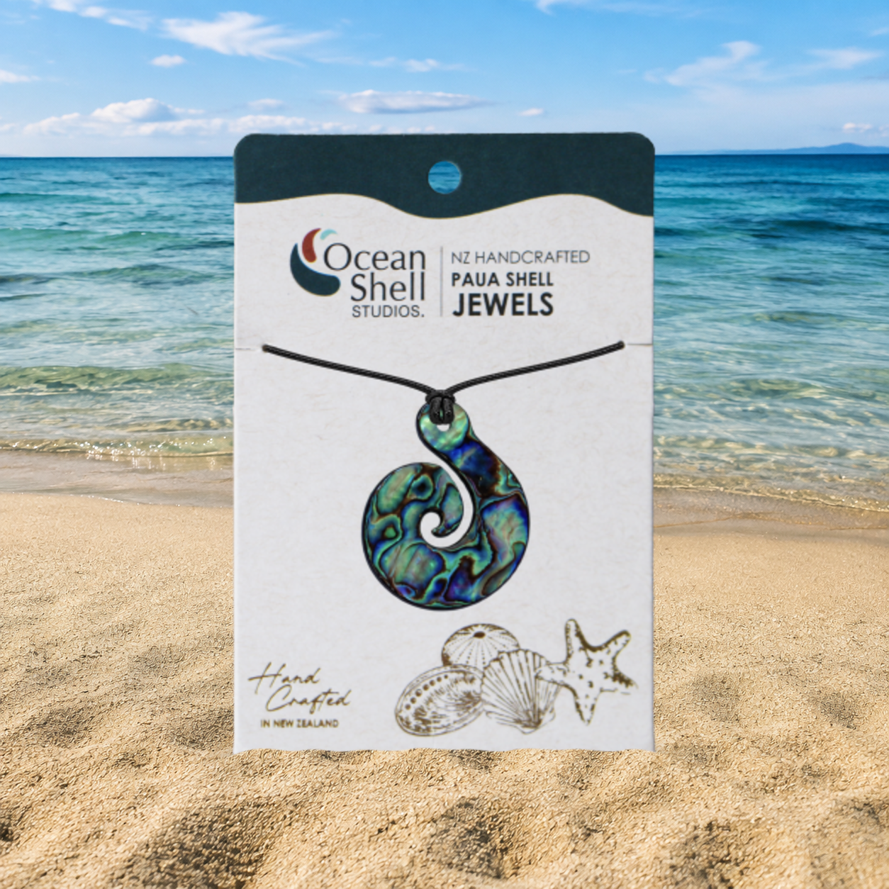 PAUA CARVED PENDANT - CORD