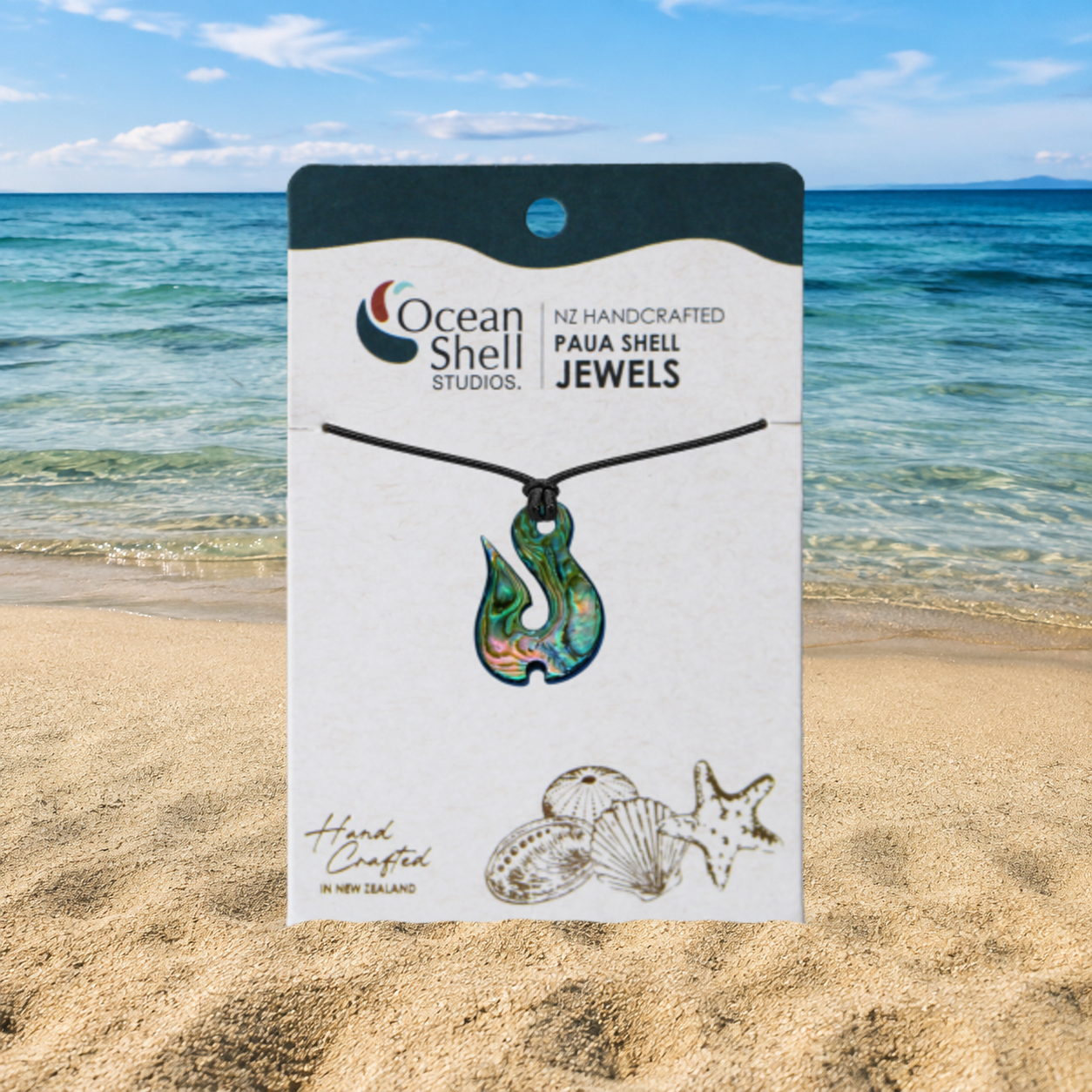 PAUA CARVED PENDANT - CORD
