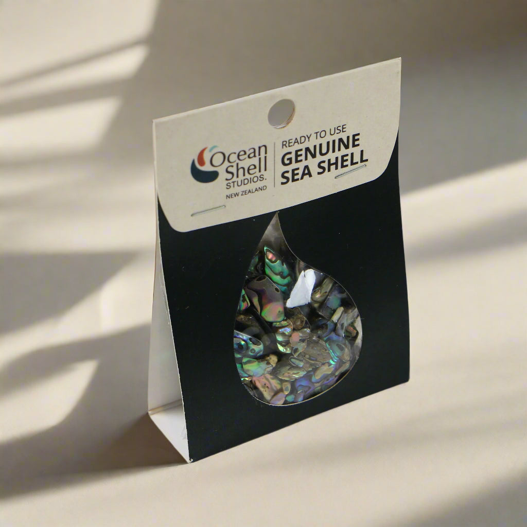 TPS215 - PAUA SOUVENIR 50g 2-15MM TUMBLED SHELL PIECES - OCEAN SHELL STUDIOS